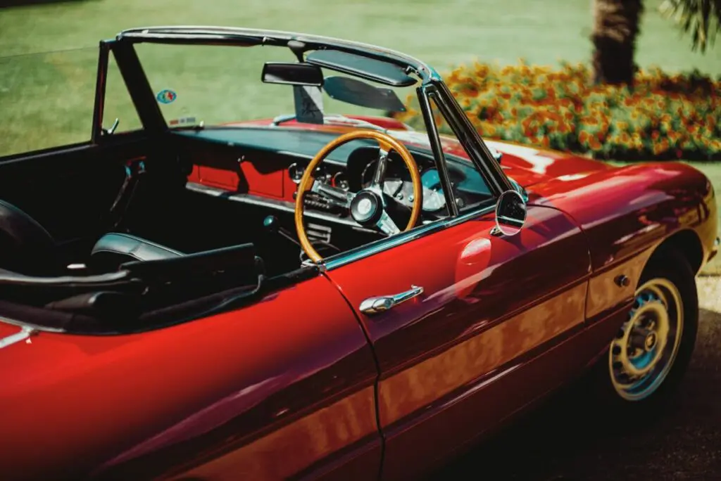 red and black convertible coupe