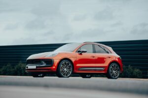 a red car parked on the side of the road